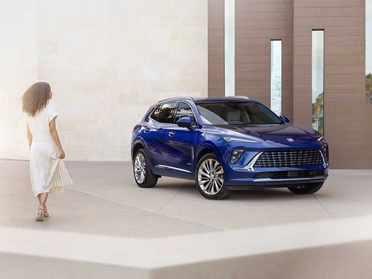 Profile View of a 2025 Buick Encore GX Parked Outside of a Home